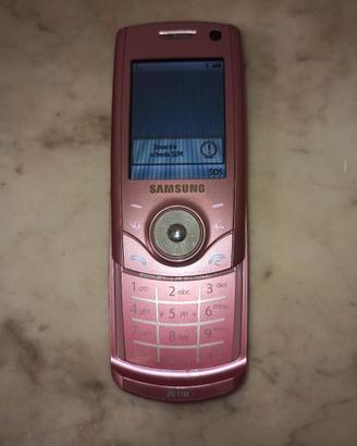 Samsung SGH-U700 rosa funzionante con cuffie