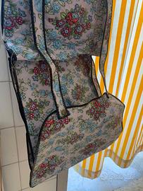 Sacca con tasche portaoggetti