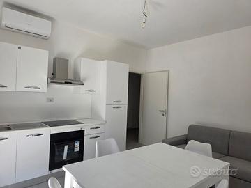 Grazioso appartamento e posto auto privato