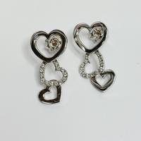 Orecchini a cuore oro 18 kt e brillanti ct. 0.20