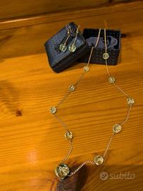 collana con orecchini in pietra azzurra