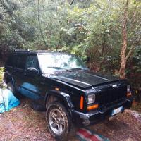 Sportelli jeep Cherokee xj 2001