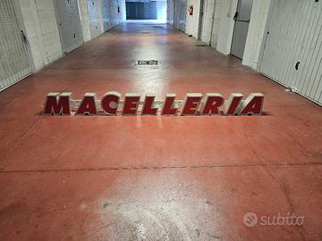 insegna luminosa "macelleria"