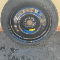 Ruotino di scorta con portagomma e crick