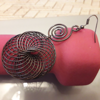 Mono orecchino geometrico tondo