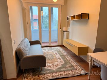 Camera privata con bagno condiviso