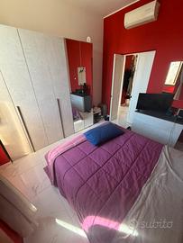 Divano letto piu camera da letto intera.