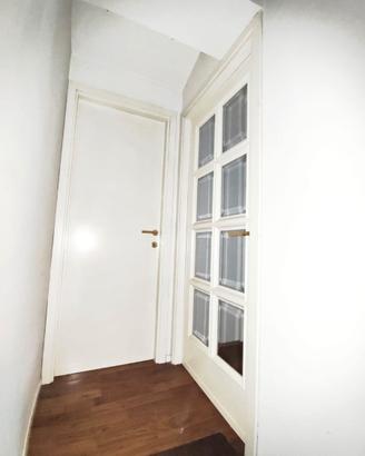 Porte legno artigianali laccate bianche