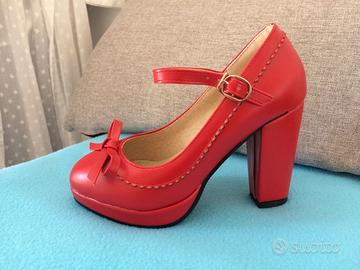 Scarpe nere con hot sale tacco rosso