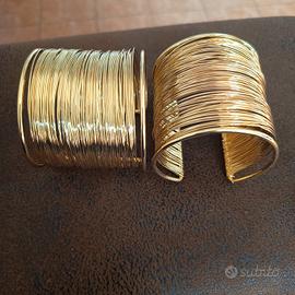 2 bracciali rigidi alti dorati multifilo schiava