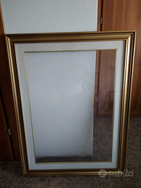 Cornice oro