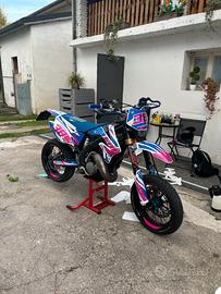 Tm en 125