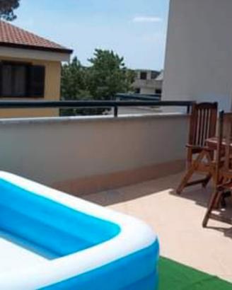 Appartamento in parco con terrazzo box e posto aut