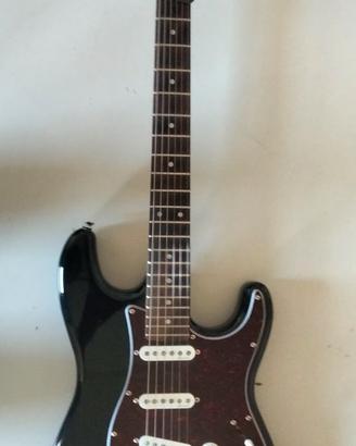 Chitarra elettrica ed amplificatore.