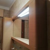 Specchio contenitore illuminato