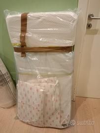 Lettino con sbarre e sponda