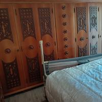 Camera da letto matrimoniale completa in legno. 