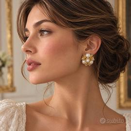 Orecchini vintage dorati con perle