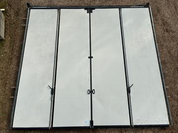 Portone a libro per capannone