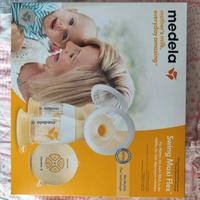 Tiralatte elettrico Medela con biberon
