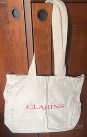 Clarins - sacca-borsa in tela ecrù
