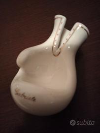 posacenere in ceramica . a forma di quantone 