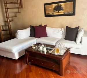 Divano letto con chaise longue