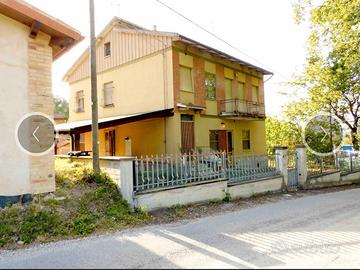 Appartamento con mansarda e terreno