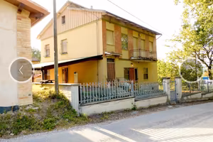Appartamento con mansarda e terreno