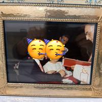 Cornice per foto in argento dorato