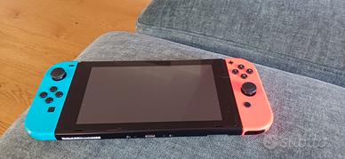 nintendo console+ giochi + astuccio + controler
