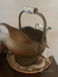 Antico porta carbone