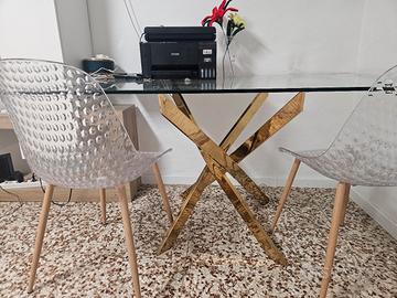 Tavolo vetro con gambe oro e sedie