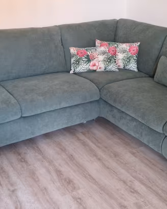 Divano letto ad angolo verde salvia