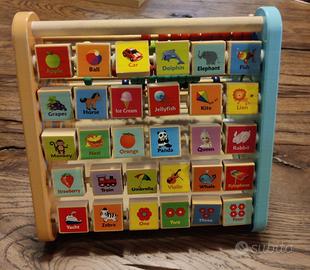 Piramide delle attività in legno per bambini