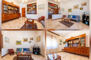 Appartamento con tre locali commerciali