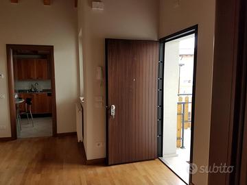 APPARTAMENTO BICAMERE + STUDIO CON GARAGE
