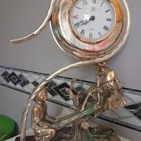 Orologio antico in argento placcato oro