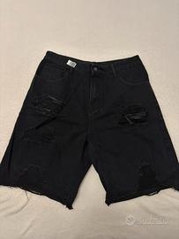 Shorts in denim neri strappati