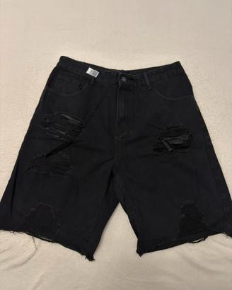 Shorts in denim neri strappati