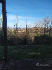 Casa con vista panoramica e giardino privato