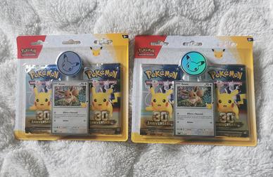 Pokémon 30° Anniversario  2 confezioni con 2 +ge+E