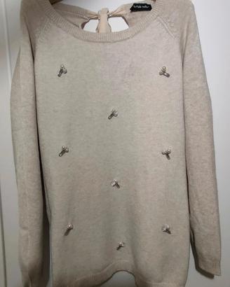 Maglione a modo nostro per donna.