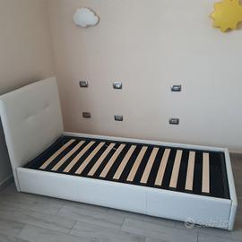 letto contenitore con testiera imbottito con rete