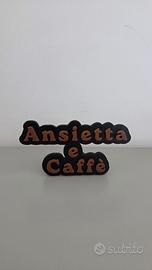 Scritta Ansietta e Caffè