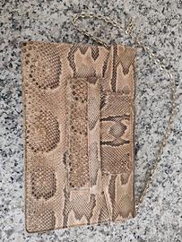 Pochette in pitone da restaurare