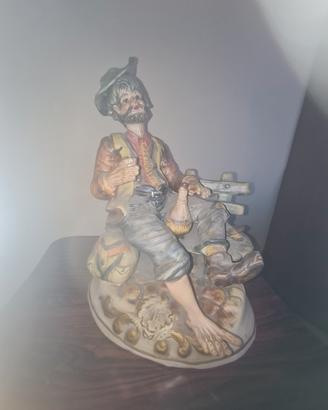 statua 
