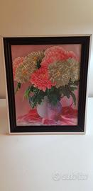 Cornice contenente piccolo lavoro manuale