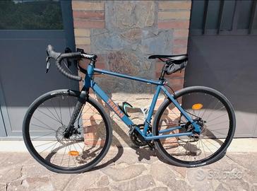 Bici da strada TRIBAN RC 120 tg M + rullo da inter