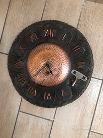 Orologio a carico rame